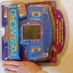 Super Password Handheld Electronic Game by Tiger